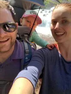 Two Adults hiking with a Baby in a Carrier