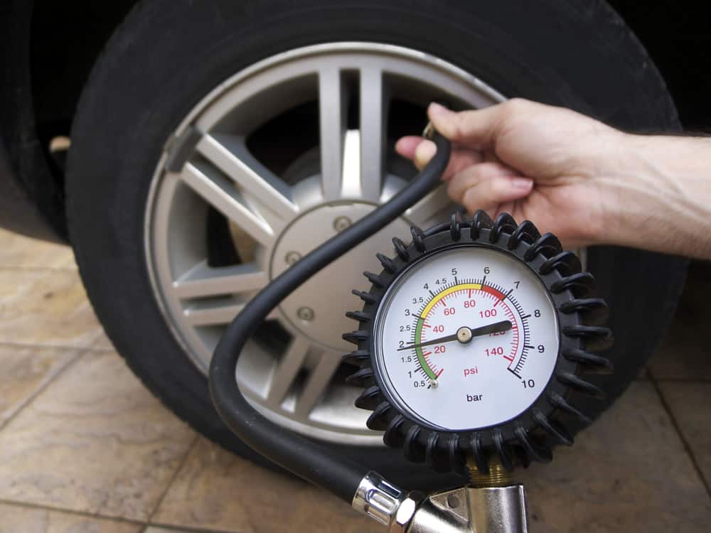 Checking the Tire Pressure in a Golf Cart