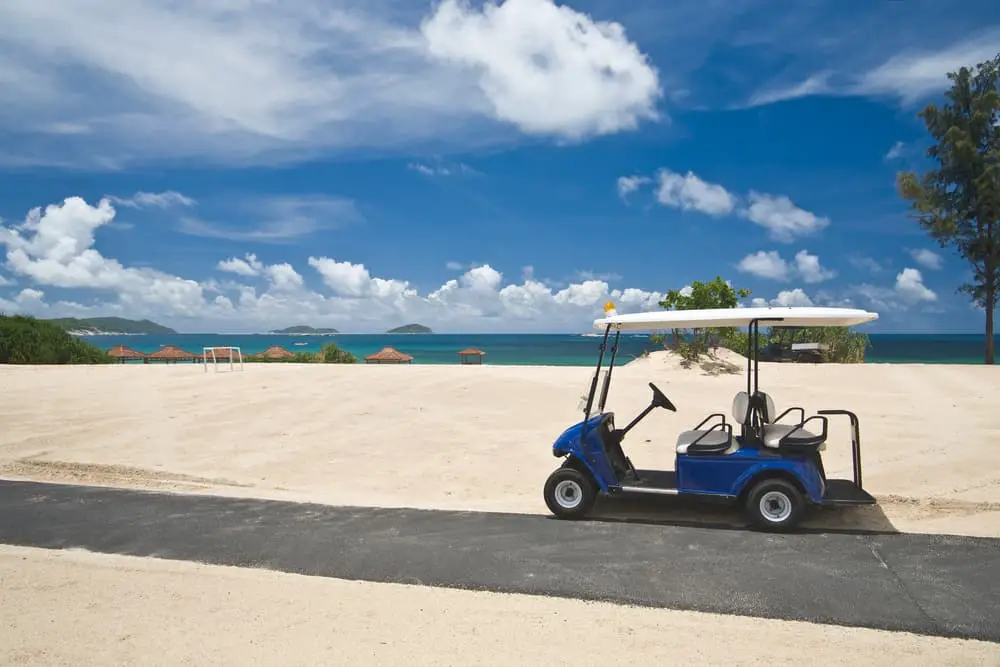 Golf Cart in the Sand with Rear Seat